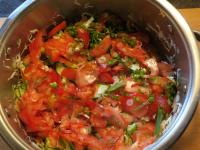 Together with the sliced tomatoes, put them in a...