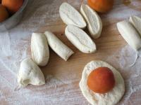 From the dough on a floured board, create a roll...