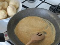 Fry the breadcrumbs dry and briefly in a pan....