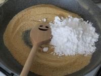 Stir sugar into the cooling bremdcrumbs....