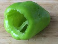 Clean and wash four smaller peppers....