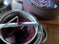 Straine the grape mix through a sieve as much as...
