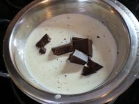 Heat the whipping cream in a water bath and melt...