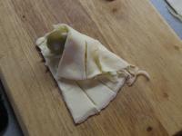 Fold the cutted parts over each other and wrap the...