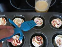 Place in a greased muffin mould, with cutted side...