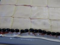 Put olives on the lower edge....