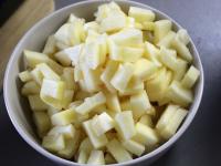 Peel the apples, cut them into smaller cubes....