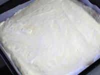 Pour the dough on a baking sheet lined with baking...