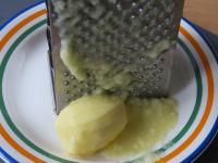 Peel a potato, wash it and grate it to a mash....
