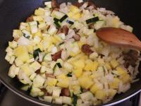 Add the vegetables to the meat....