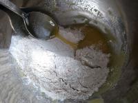 Add the flour to the butter-honey base ......