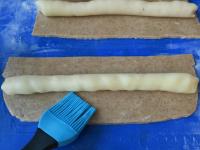 Divide the marzipan into quarters. Create a roller...