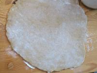 Roll the lightly solidified dough on a floured...