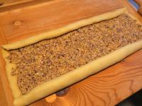 Spread the filling evenly on the dough. Wrap the...