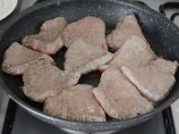 Turn the meat over and fry from the other side....