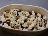 Crumble the cheese and a handful of crushed...