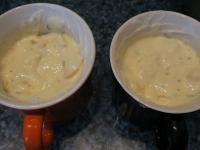 Grease two larger cups with fat or butter. Fill up...