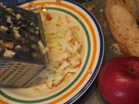 Wash and grate the apples with the peel....