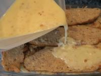 Put the last layer of soaked rolls and cover with...