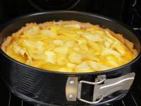 Cover with roasted apples and bake in a preheated...