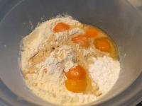 Put flour into the bowl, add sugar, eggs, egg...