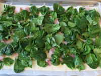 Cut the ham finely, sprinkle the dough and cover...