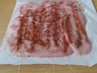 Put the meat on baking paper to a size of 30x30...