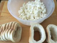 Remove the middle of the cutted bread and put it...
