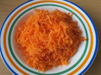 Clean the carrots, wash and grate it....