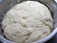Knead the dough, which you let rise in a warm...