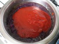 Finally mix in the tomato puree and boil....