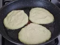 Shape a pancake from the prepared dough in a pan...