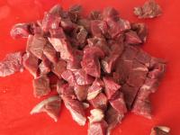 Wash the meat and cut it into smaller cubes....