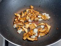 Add the sliced clove of garlic and fry for a while...
