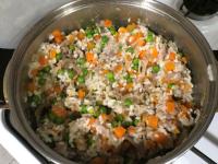 Stir the rice into the vegetable-duck base. Serve...