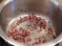 Peel an onion, chop finely and cook in oil....