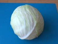 Wash a smaller head of cabbage and cut into slices...