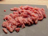 Cut the pork into slices and let it warm almost to...