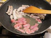 Pour oil into a hot pan and fry the meat. Add...