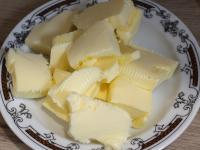 Whip butter into the cooled cream....