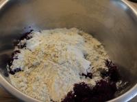 Add flour to the cabbage and add caraway. Mix...