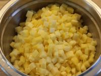 Peel a potatoes, wash and cut them into small...