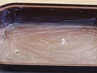 Grease the baking dish with butter....