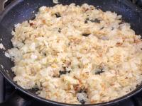 Peel and cut the onion and fry it in fat....