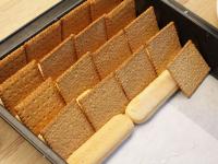 ... with lightly soaked long biscuits, put them in...