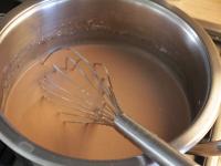 Bring half of the milk with sugar to a boil. In...