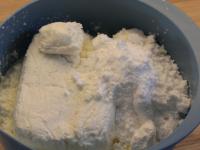Whip the whipping cream, add sugar and cottage...