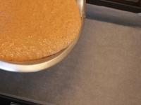 Pour the dough on a baking sheet lined with baking...