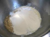 Add flour, baking powder and nuts. Whip it...