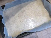 Pour the dough on a baking sheet lined with baking...